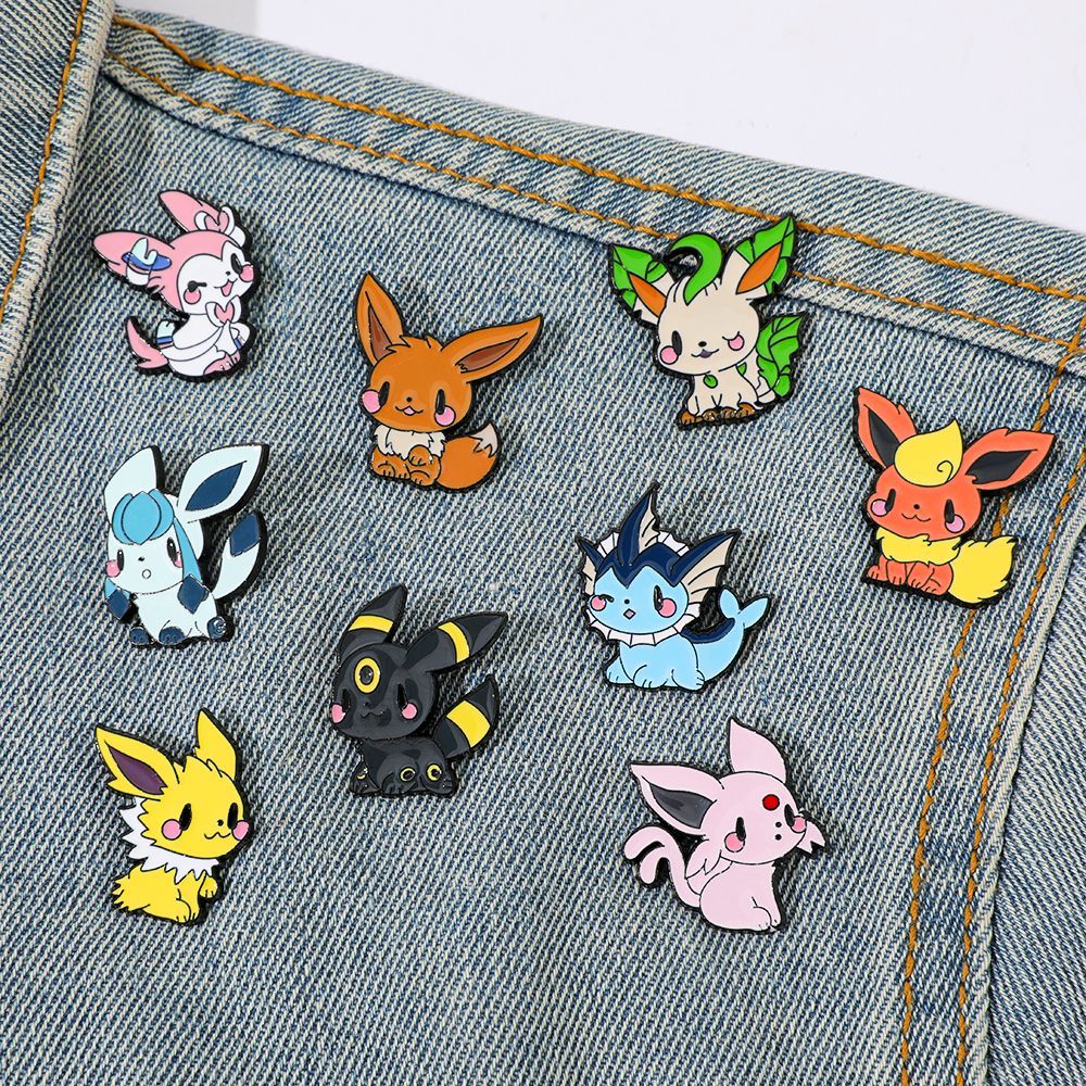 Anime Cosplay Pokemon - かわいいポケモンイーブイエナメルピンアニメメタルブローチかわいいイーブリューションラペルバッジバックパックジュエリーギフト